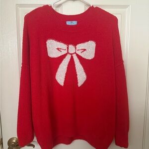 Red Sweater with Bow Design